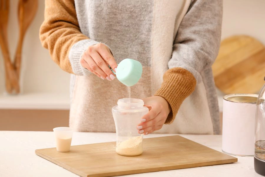 Parent mixing infant milk formula